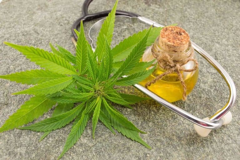 marijuana, cannabis oil and stethoscope